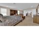 Well-lit main bedroom with a view into the living room and stairwell at 2714 Frabiele St, Henderson, NV 89044