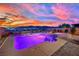 Inviting pool and spa with city view, set against a colorful sky at 2714 Frabiele St, Henderson, NV 89044