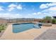 Serene pool and spa area with a desert view, offering a perfect spot for relaxation and recreation at 2714 Frabiele St, Henderson, NV 89044
