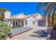 The backyard features a covered patio, gravel landscaping, and a shed for additional storage at 2752 Devita Cir, Las Vegas, NV 89117