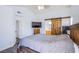 Bedroom with wood-look floors and TV at 2752 Devita Cir, Las Vegas, NV 89117