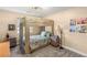Bedroom showcasing a bunk bed with wooden frame, complemented by a bedside table at 286 Bowsprit Ct, Las Vegas, NV 89183