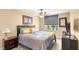 Cozy bedroom featuring a ceiling fan and comfortable bed with decorative pillows at 286 Bowsprit Ct, Las Vegas, NV 89183