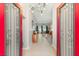 Inviting foyer with red double doors, leading into a spacious living area with a pool table at 286 Bowsprit Ct, Las Vegas, NV 89183