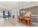 Open-concept living area with a pool table, wet bar, and ample seating, perfect for entertaining at 286 Bowsprit Ct, Las Vegas, NV 89183