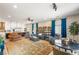 Bright, open-concept living room with hardwood floors and views of kitchen at 286 Bowsprit Ct, Las Vegas, NV 89183