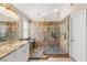 The main bathroom features dual sinks, granite counters, and a custom glass shower at 286 Bowsprit Ct, Las Vegas, NV 89183