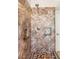 The main bathroom features a custom glass shower with tile, and built-in shelves at 286 Bowsprit Ct, Las Vegas, NV 89183
