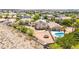 Aerial view of a home with pool, turfed area, and desert landscaping in a suburban community at 3169 Crystal Moon Rd, Henderson, NV 89052