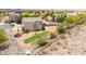 The backyard offers mountain views with a putting green, mature trees, and custom landscaping at 3169 Crystal Moon Rd, Henderson, NV 89052