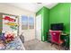 Comfortable bedroom with window views and a cozy study corner at 3169 Crystal Moon Rd, Henderson, NV 89052