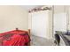 Cozy bedroom featuring a closet with white doors and gray carpet flooring at 3169 Crystal Moon Rd, Henderson, NV 89052