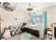 Bright bedroom with a plush rug, decorative canopy, and a window view at 3169 Crystal Moon Rd, Henderson, NV 89052