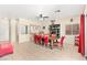 Spacious dining room with stylish chairs and a ceiling fan for added comfort at 3169 Crystal Moon Rd, Henderson, NV 89052
