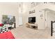 Open-concept living area with tile flooring, high ceilings, and large windows providing lots of natural light at 3169 Crystal Moon Rd, Henderson, NV 89052
