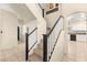 Staircase with carpeted steps, and a landing, offers a great view of the home at 3169 Crystal Moon Rd, Henderson, NV 89052