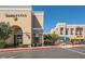 Panera Bread and other stores front this commercial area near a beautiful neighborhood at 324 Quiet Harbor Dr, Henderson, NV 89052