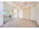 Cozy dining area with carpet flooring and an elegant chandelier at 324 Quiet Harbor Dr, Henderson, NV 89052