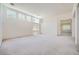 Bright, open living room with multiple windows providing ample natural light at 324 Quiet Harbor Dr, Henderson, NV 89052