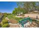 Scenic community park with benches and walking paths for residents at 324 Quiet Harbor Dr, Henderson, NV 89052