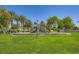 Outdoor playground for children located in a green space in this well-maintained neighborhood at 324 Quiet Harbor Dr, Henderson, NV 89052