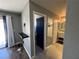 Bedroom with sliding doors to bathroom and balcony at 3736 Steinbeck Dr, Las Vegas, NV 89115