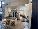 Modern kitchen with stainless steel appliances and breakfast bar at 3736 Steinbeck Dr, Las Vegas, NV 89115