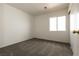 A bedroom with carpet flooring and a window to provide natural light at 4439 Scarlet Sea Ave, North Las Vegas, NV 89031