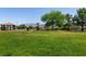 Expansive green community park with play structures and covered seating areas at 4439 Scarlet Sea Ave, North Las Vegas, NV 89031