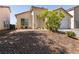 Inviting single-story home featuring a well-kept front yard with desert landscaping at 4439 Scarlet Sea Ave, North Las Vegas, NV 89031