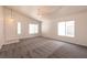 Bright and airy living room with plush carpet, and neutral paint at 4439 Scarlet Sea Ave, North Las Vegas, NV 89031