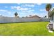 Expansive backyard with lush green grass and privacy fence. Plenty of space for entertaining at 5155 Saratoga Dr, Las Vegas, NV 89120