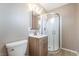 Bathroom featuring a modern vanity, toilet, and glass-enclosed shower with updated fixtures at 5155 Saratoga Dr, Las Vegas, NV 89120
