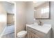 Well-lit bathroom with a modern vanity, toilet, and updated fixtures at 5155 Saratoga Dr, Las Vegas, NV 89120