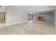 Spacious living room with tile floors, an open layout, and a traditional brick fireplace at 5155 Saratoga Dr, Las Vegas, NV 89120