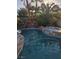 A stunning pool and spa offer a relaxing oasis for outdoor enjoyment at 5717 Blizzard Breeze St, North Las Vegas, NV 89081