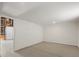 Unfinished basement with a concrete floor and walls, offering ample storage or customization potential at 636 H Ave, Boulder City, NV 89005