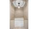 Elegant bathroom featuring a soaking tub under an arched ceiling with a chandelier at 636 H Ave, Boulder City, NV 89005