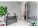 Outdoor balcony with comfortable seating and a view through the sliding glass door at 659 Spotted Falcon St, Las Vegas, NV 89138