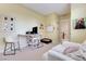 Comfortable bedroom with modern furnishings, featuring a cozy seating area and neutral tones at 659 Spotted Falcon St, Las Vegas, NV 89138
