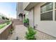 Private courtyard featuring a brick paver patio and decorative landscaping in a modern townhome community at 659 Spotted Falcon St, Las Vegas, NV 89138