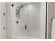 Contemporary glass shower with white subway tile and modern fixtures, offering a spa-like experience at 659 Spotted Falcon St, Las Vegas, NV 89138