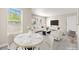 Cozy dining area flows into a bright living room, creating an inviting space at 6800 E Lake Mead Blvd # 1018, Las Vegas, NV 89156