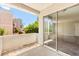 Exterior patio with sliding glass door access at 6800 E Lake Mead Blvd # 1018, Las Vegas, NV 89156