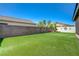 Artificial turf and mature landscaping at 7488 Evening Falls Dr, Las Vegas, NV 89131