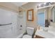 Well-lit bathroom with a shower-tub combo and single sink vanity at 7488 Evening Falls Dr, Las Vegas, NV 89131
