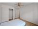 Carpeted bedroom showing a closet and view into the hall at 7488 Evening Falls Dr, Las Vegas, NV 89131