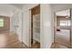 Hallway view showcasing a closet and entry to a bedroom at 7488 Evening Falls Dr, Las Vegas, NV 89131