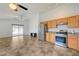 Open layout kitchen view with stainless appliances and an island open to the living area at 7488 Evening Falls Dr, Las Vegas, NV 89131