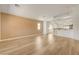 Bright living room with wood flooring and neutral paint at 7488 Evening Falls Dr, Las Vegas, NV 89131